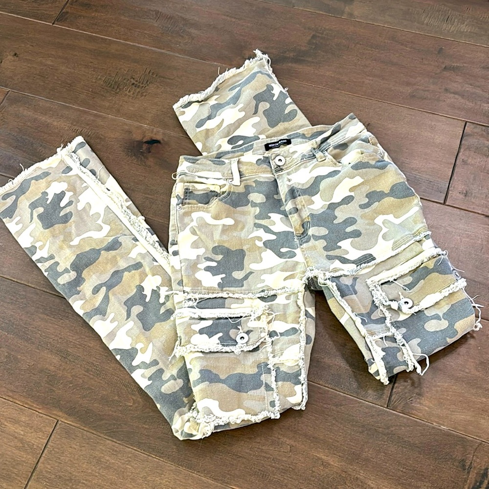 Distressed camo jeans